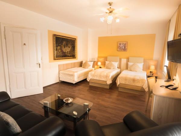 Hotel Carlton Mayfair : photo 1 de la chambre chambre triple