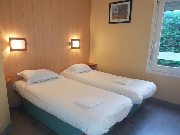 Fasthotel Carcassonne : photo 1 de la chambre chambre lits jumeaux avec 2 lits simples