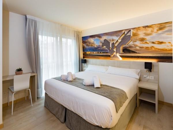 Atotxa Rooms : photo 2 de la chambre chambre double ou lits jumeaux supérieure avec vue sur ville