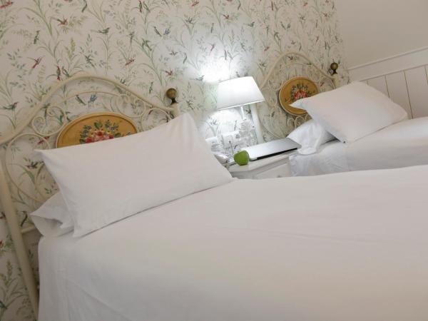 Basic Hotel Puerta de Sevilla : photo 2 de la chambre chambre double ou lits jumeaux standard
