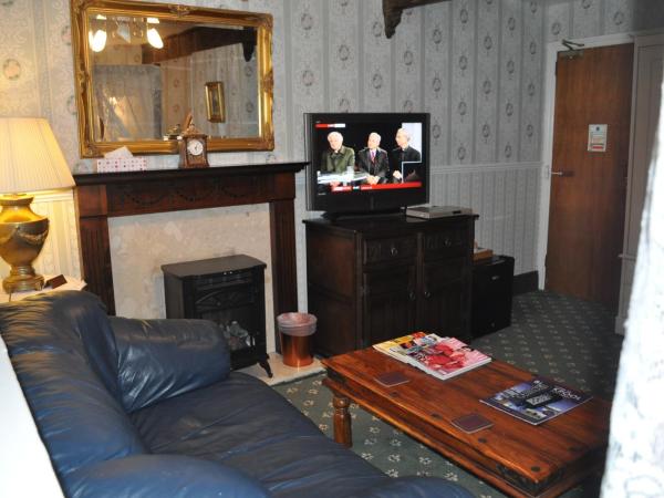 The New Guilderoy Hotel : photo 6 de la chambre suite avec lit à baldaquin