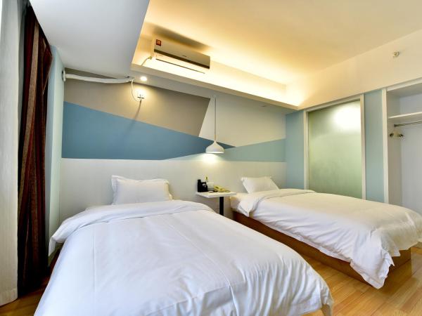 Jihao Selected Hotel : photo 4 de la chambre chambre lits jumeaux avec douche