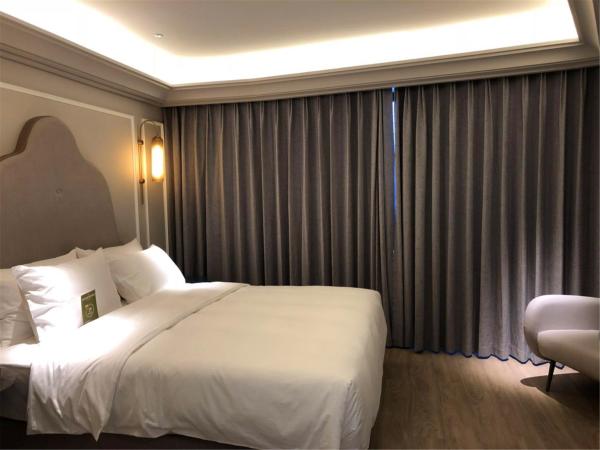 Mercure Hangzhou West Lake : photo 1 de la chambre chambre lit king-size supérieure