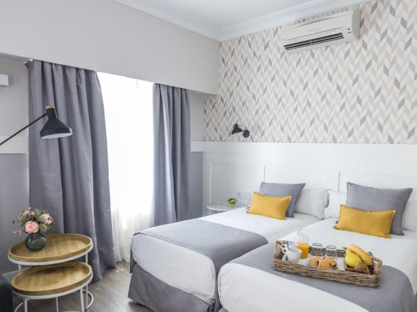 BYPILLOW Velázquez 45 : photo 8 de la chambre chambre double