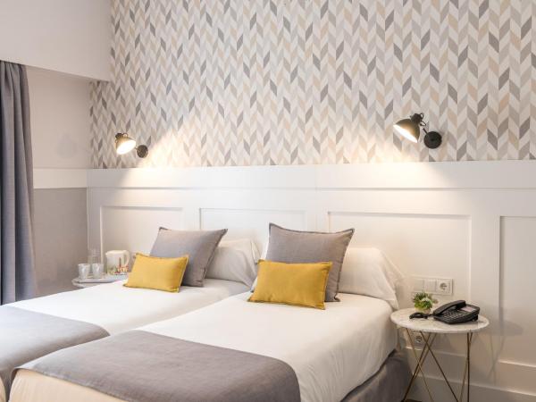 BYPILLOW Velázquez 45 : photo 1 de la chambre chambre lits jumeaux