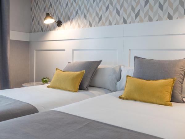 BYPILLOW Velázquez 45 : photo 2 de la chambre chambre triple