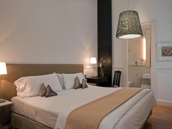 Esplendor by Wyndham Savoy Rosario : photo 7 de la chambre chambre standard lit queen-size