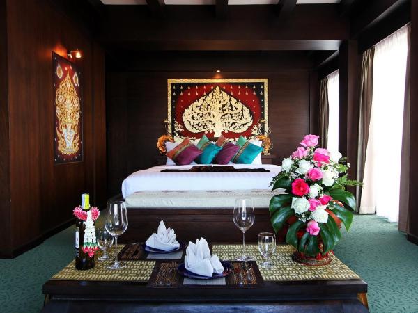 Singha Montra Lanna Boutique Style Hotel : photo 5 de la chambre suite lanna avec bain à remous