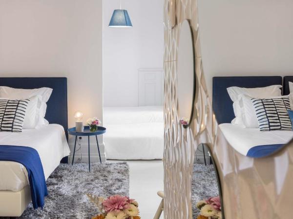 Penedo da Saudade Suites & Hostel : photo 8 de la chambre chambre familiale supérieure