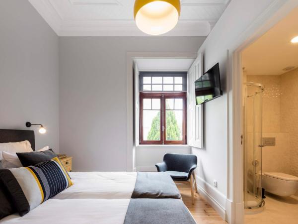 Penedo da Saudade Suites & Hostel : photo 4 de la chambre chambre lits jumeaux