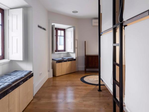 Penedo da Saudade Suites & Hostel : photo 1 de la chambre chambre familiale