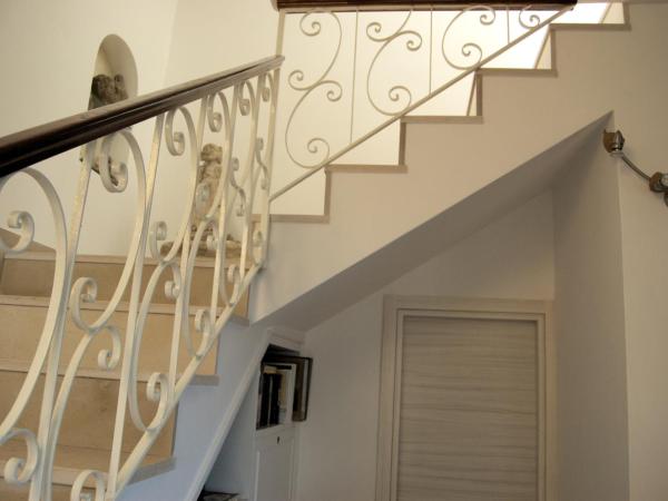 La Terrazza sul Mare : photo 6 de la chambre chambre lit queen-size - vue sur jardin