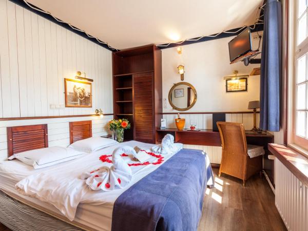 Boat Hotel De Barge : photo 2 de la chambre cabine croisière - vue sur jardin