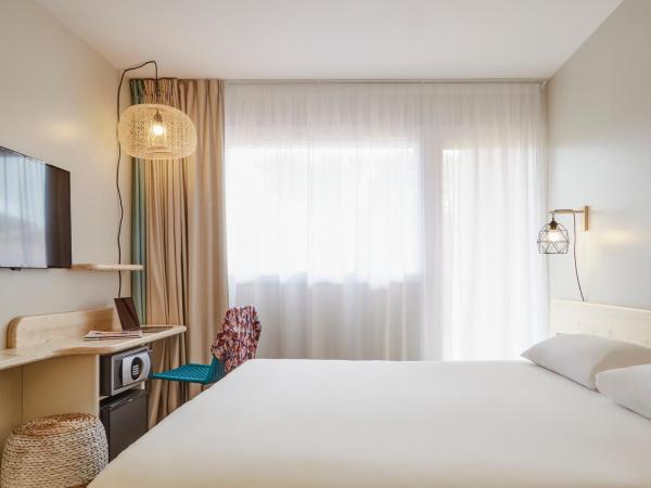 ibis Thalassa Hyeres Plage : photo 5 de la chambre chambre double classique avec balcon - vue sur jardin