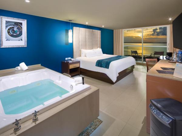 Hard Rock Hotel Cancun - All Inclusive : photo 3 de la chambre hébergement lit king-size deluxe – vue sur lagune