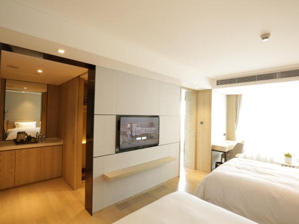 Shenzhen FY Hotel : photo 6 de la chambre chambre lits jumeaux deluxe