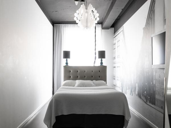 Hotel Flora : photo 3 de la chambre grande chambre simple (lit de 140 cm)