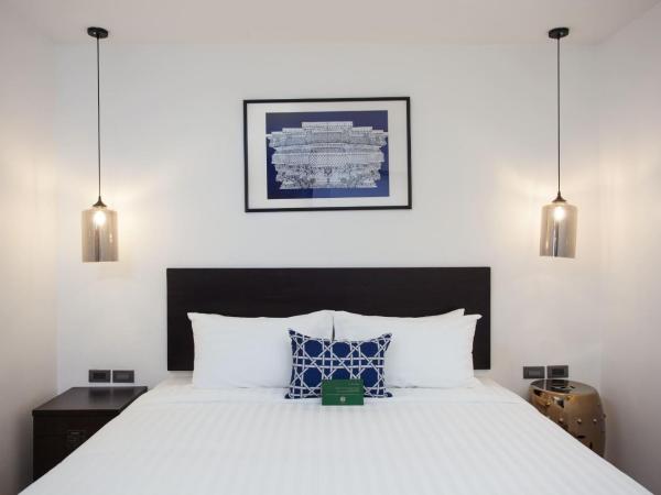 Oriental Heritage Residence : photo 2 de la chambre suite deluxe avec lit king-size