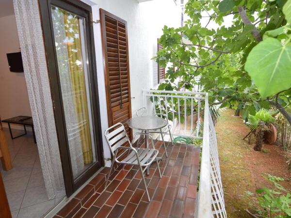 Arthouse Villa Palma : photo 10 de la chambre appartement - vue sur jardin