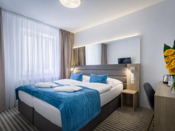 Hotel White Lion : photo 4 de la chambre suite familiale