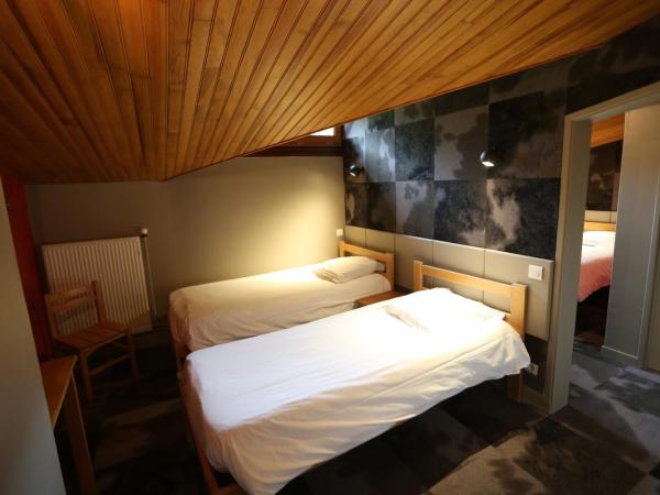 Gîte-Hôtel Le P'tit Cham : photo 1 de la chambre chambre quadruple - duo