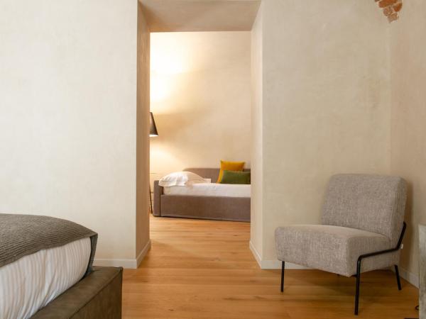 Relais San Vigilio al Castello : photo 3 de la chambre suite familiale deluxe