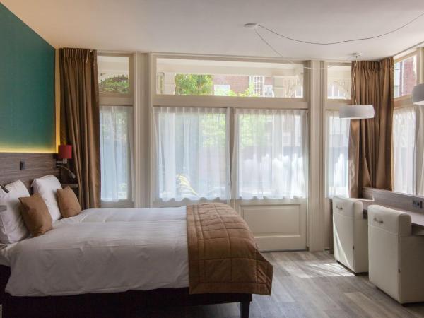 Best Western Hotel Den Haag : photo 5 de la chambre chambre lits jumeaux familiale