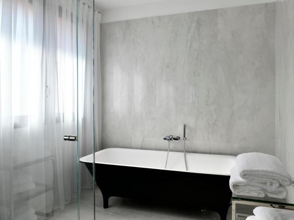 Hôtel Restaurant le Touring - Teritoria : photo 5 de la chambre suite deluxe - vue sur mer