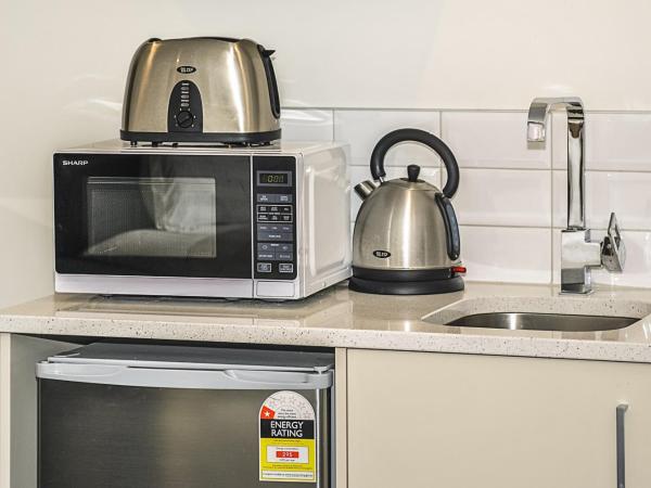 Newlands Court Motel : photo 10 de la chambre premium executive studio with bath