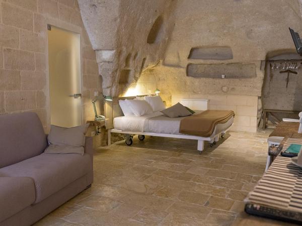 Thymus Residence nei Sassi : photo 2 de la chambre suite troglodyte