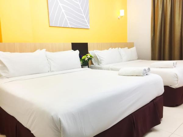 Temasek Hotel : photo 1 de la chambre chambre familiale quadruple