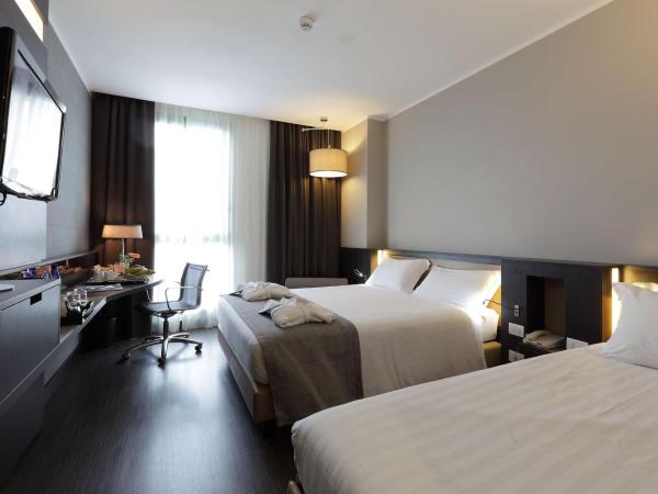 Best Western Premier CHC Airport : photo 4 de la chambre chambre triple standard avec 1 lit queen-size et 1 lit simple - non-fumeurs