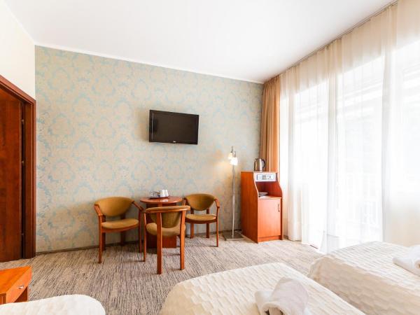 Ośrodek Wypoczynkowy Wiga : photo 2 de la chambre chambre triple avec balcon
