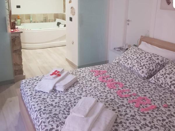 Il Daviduccio Suite : photo 10 de la chambre suite avec baignoire spa