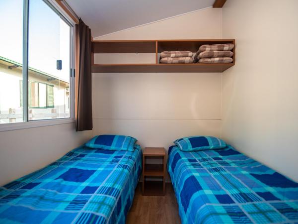 Camping Media Mobile Homes in Brioni Sunny Camping : photo 10 de la chambre mobile home confortable 3 chambres avec terrasse