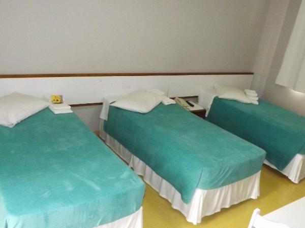 Rede Andrade San Martin : photo 1 de la chambre chambre triple standard avec 3 lits simples