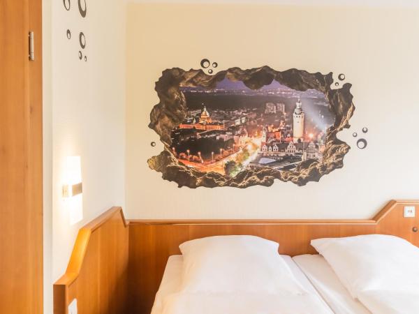 Hotel Markgraf Leipzig : photo 8 de la chambre chambre lits jumeaux