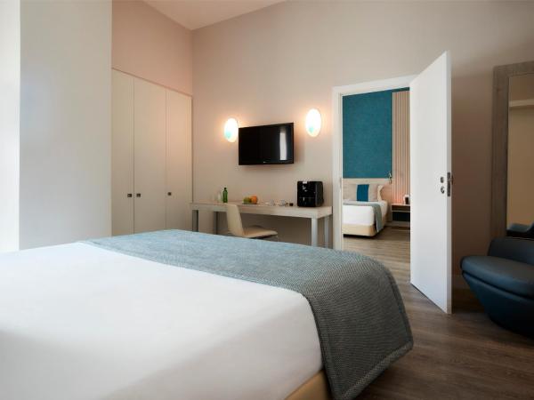 Hotel Faro & Beach Club : photo 4 de la chambre chambre familiale