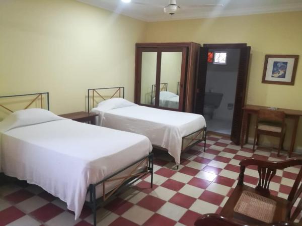 Villa Carolina Bed and Breakfast : photo 4 de la chambre chambre triple Économique