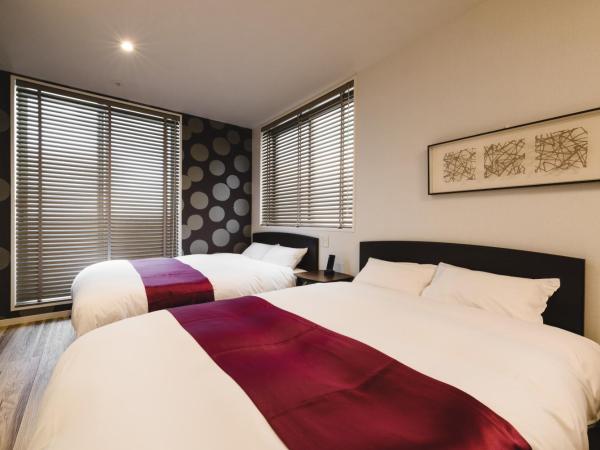 Trip Base HAKATAEKIMAE : photo 5 de la chambre chambre familiale standard