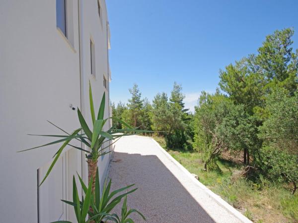 Villa Inis : photo 2 de la chambre suite lit queen-size – vue sur mer