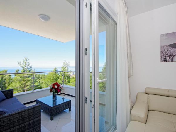 Villa Inis : photo 9 de la chambre suite lit queen-size – vue sur mer