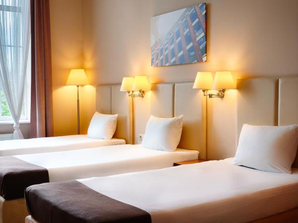 Focus Hotel Łódź : photo 3 de la chambre chambre familiale