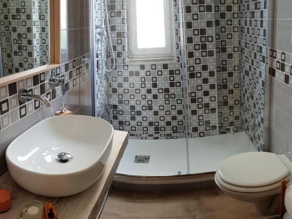 TORRE ANGELLARA B&B : photo 8 de la chambre chambre double ou lits jumeaux avec salle de bains privative externe