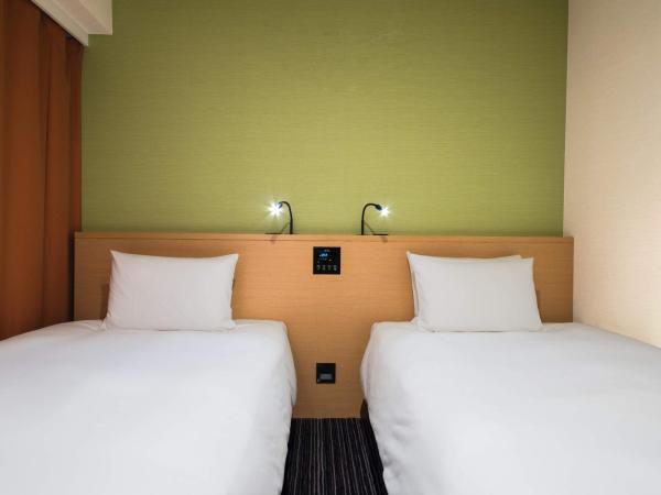 the b ikebukuro : photo 3 de la chambre chambre lits jumeaux supérieure avec douche - non-fumeurs