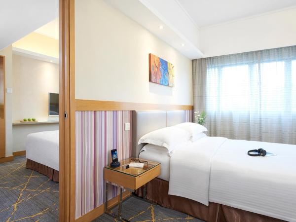 The Cityview - Chinese YMCA of Hong Kong : photo 2 de la chambre deluxe quad (one double and two singles)