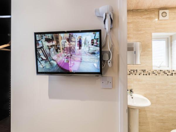 Saba Hotel London : photo 2 de la chambre chambre triple avec lit double et simple