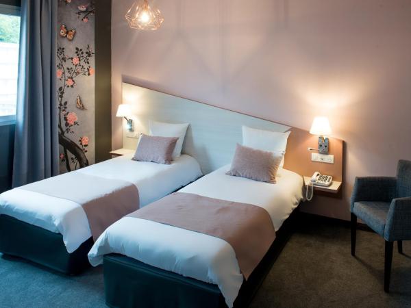 Hôtel Sainte-Rose : photo 2 de la chambre chambre lits jumeaux