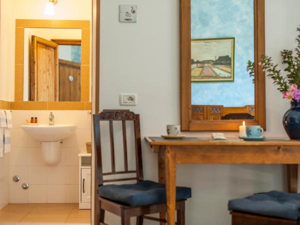 B&B La Coperta Ricamata : photo 2 de la chambre chambre triple avec balcon