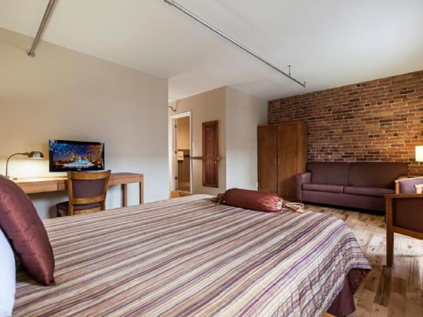 Hotel Abri du Voyageur : photo 1 de la chambre chambre lit queen-size supérieure avec canapé-lit